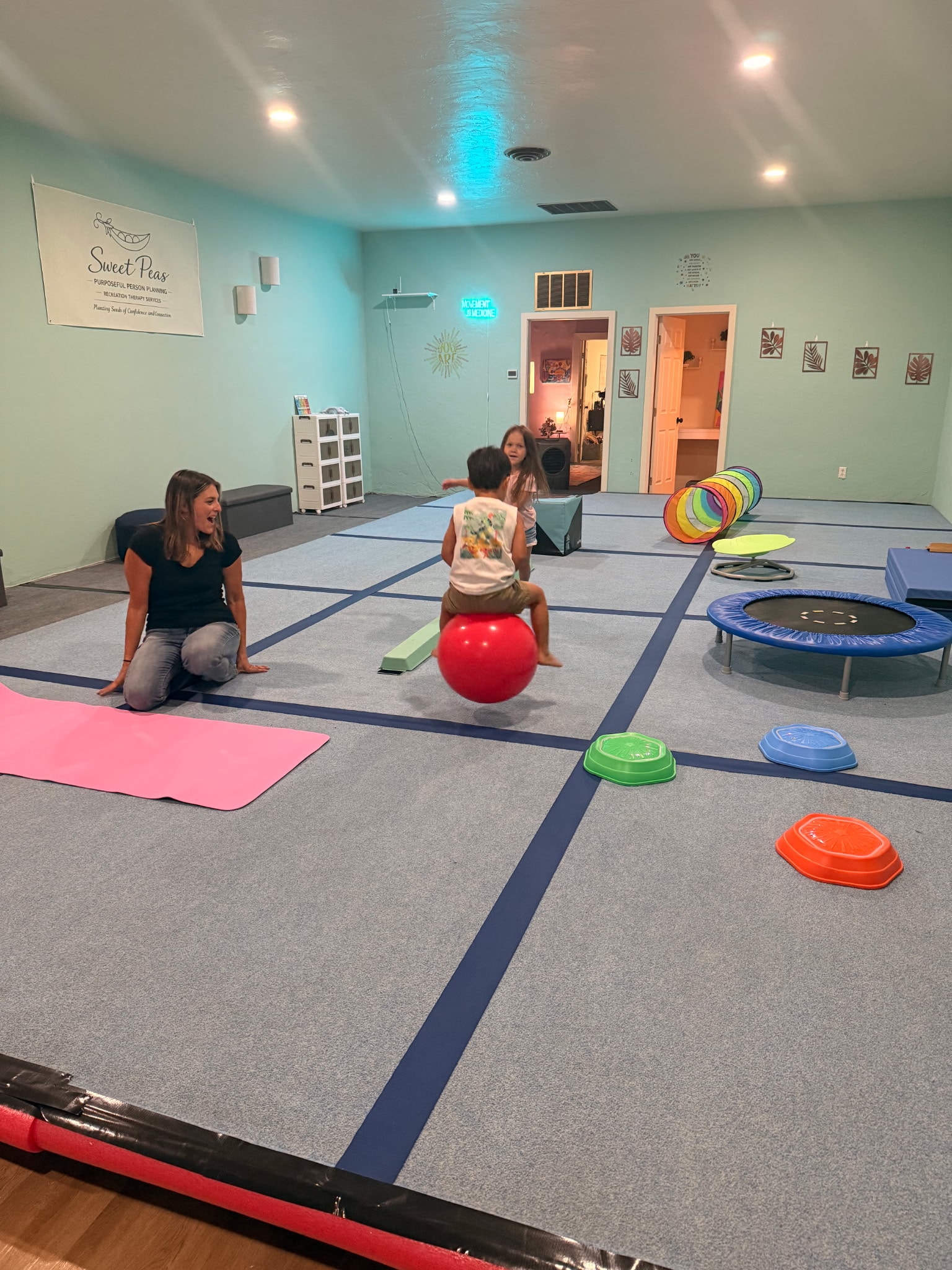 Children playing therapy gym games